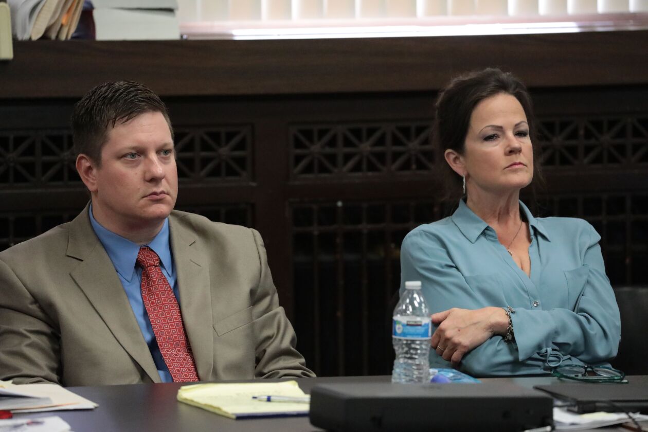 Jason Van Dyke listens to closing statements with defense attorney Tammy Wendt during his trial for the shooting death of Laquan McDonald, at the Leighton Criminal Court Building in 2018.